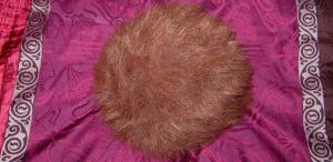For non-Trekkies, this is a tribble, an alien ball of fur that purrs endearingly and multiplies voraciously. Also, it is a mortal enemy of the Klingon Empire.