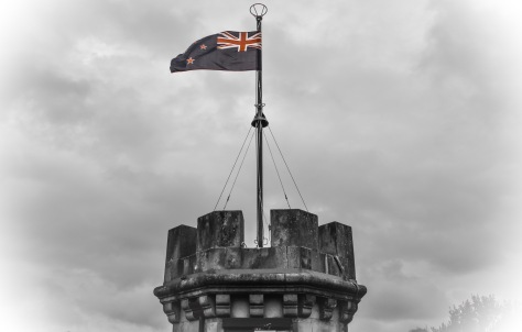larnach castle tower new zealand flag